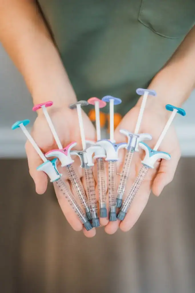 Silicone syringes used in medical aesthetic treatments at Brooke Nix Medical Aesthetics.